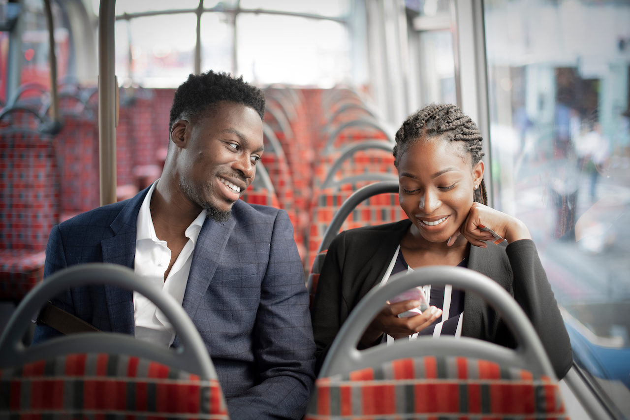 Business partners riding the bus to work Business partners riding the bus to work